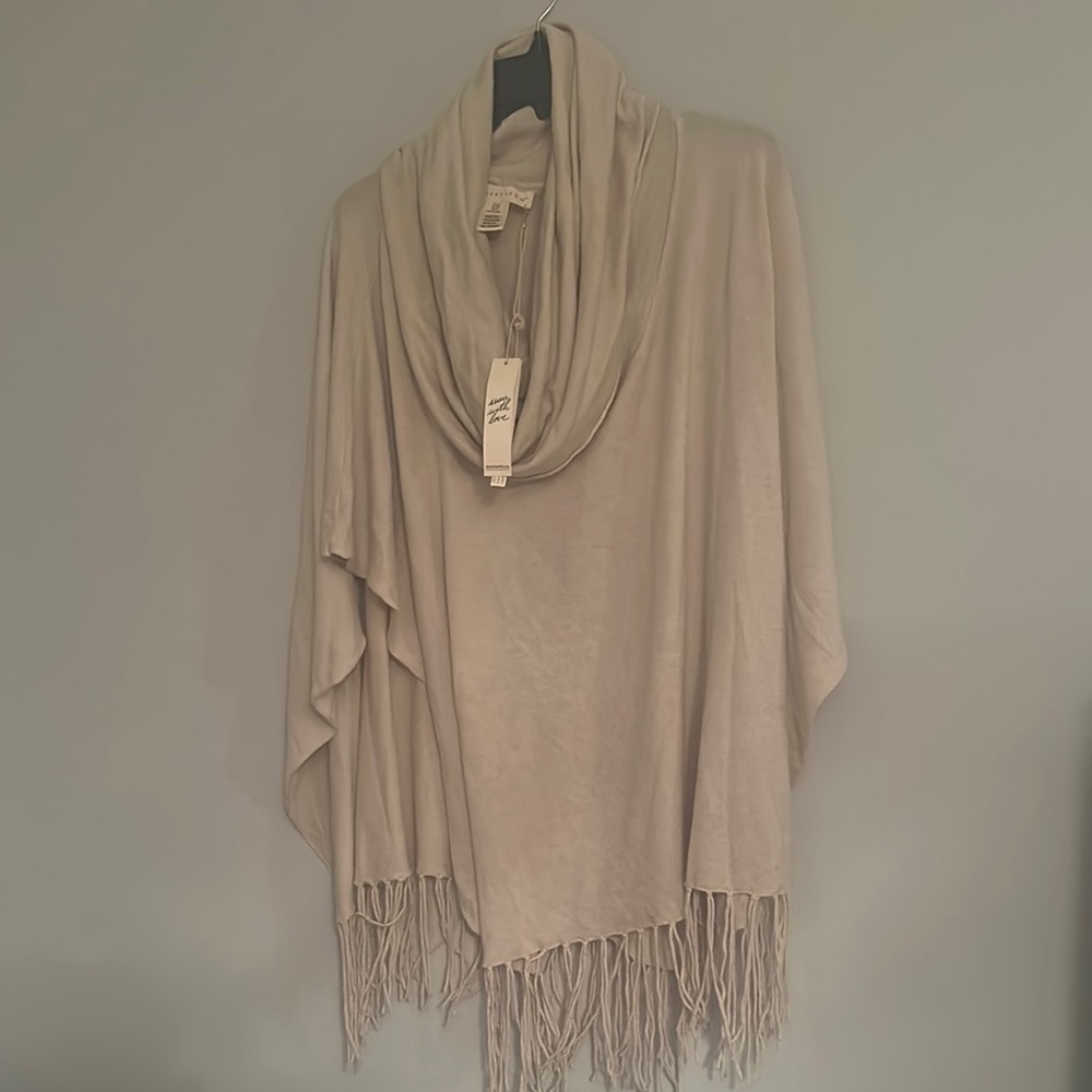 Elegant Beige Poncho with Fringe